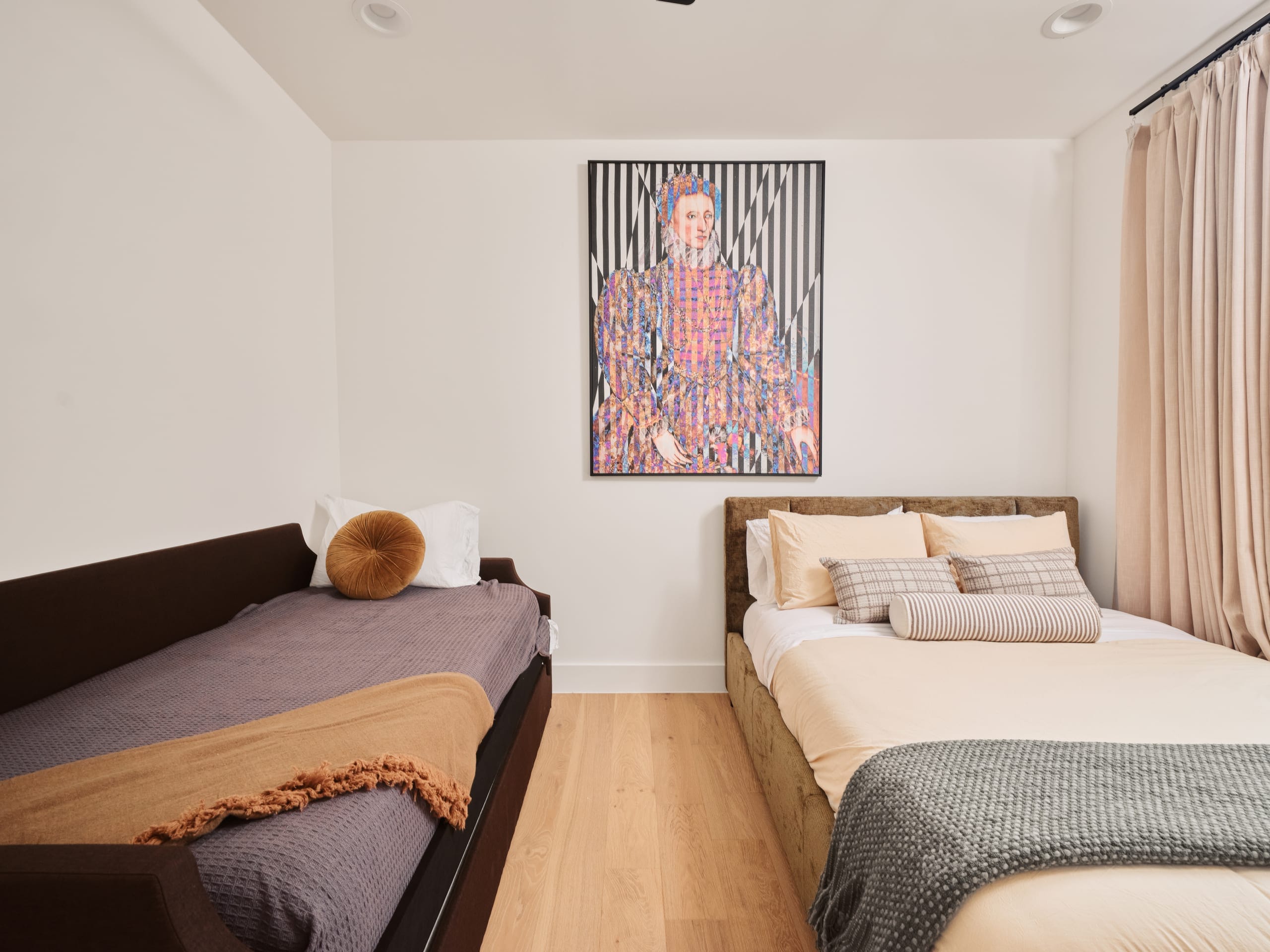 The Gallery Suite with a queen bed and two single daybeds