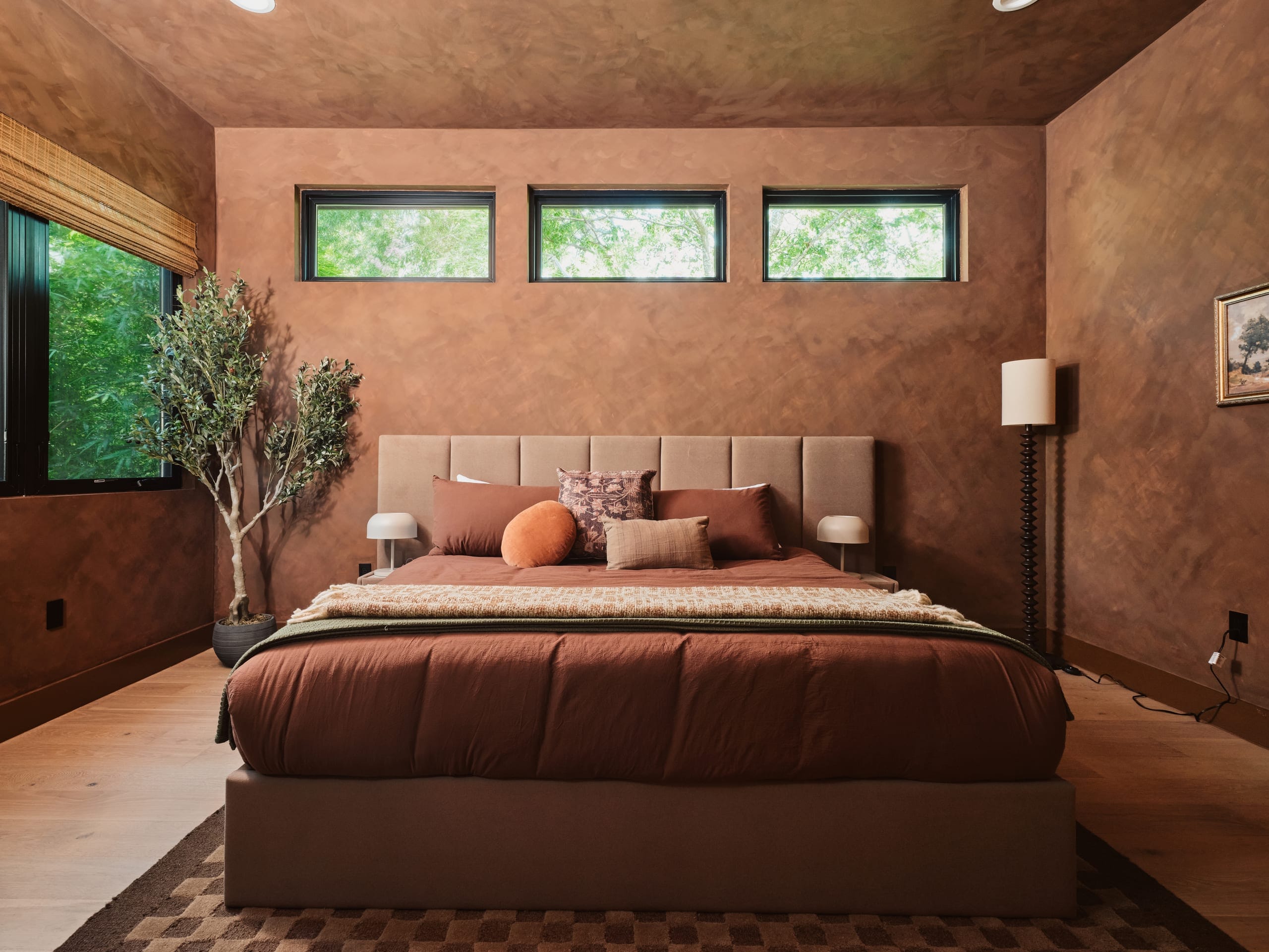 The Studio Suite with a king bed and black and white mural